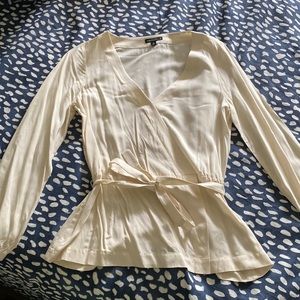 Cream colored V-neck wrap shirt with tie belt, worn once!!